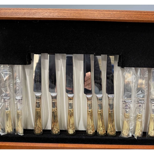 135 - A Davenport and Sullivan canteen of cutlery, A1 silver-plated, made in Sheffield, housed in a doveta... 