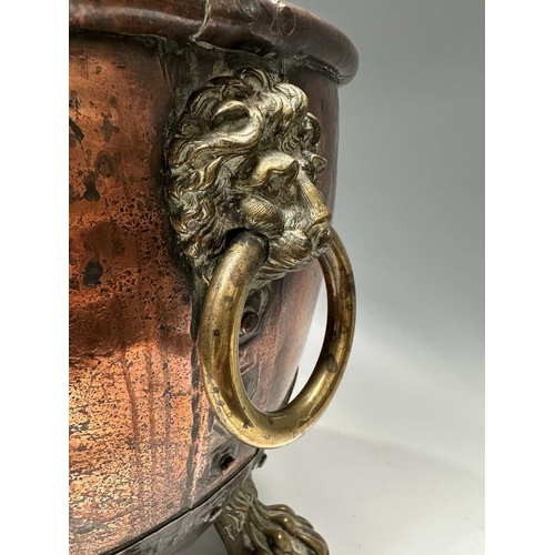 139 - A 19th century copper log bucket or coal scuttle, panels of copper riveted with brass, supported on ... 