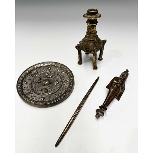 142 - A collection of Indian metalware, to include a cosmetics pot/Kohl maker on four brass legs, h: 11cm,... 