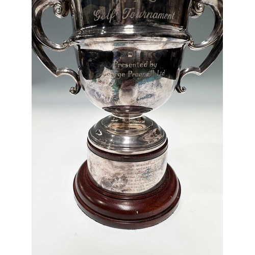144 - A twentieth-century plated trophy cup and cover, for the 'W.F.C. Golf Tournament...Presented by Geor... 