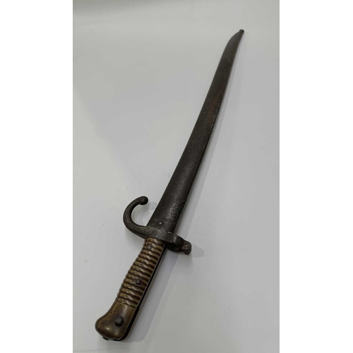 151 - A French Chassepot bayonet engraved to blade 'Tulle Fevrier 1872', with F. G. 50262 stamped to the g... 