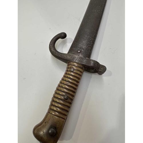 151 - A French Chassepot bayonet engraved to blade 'Tulle Fevrier 1872', with F. G. 50262 stamped to the g... 
