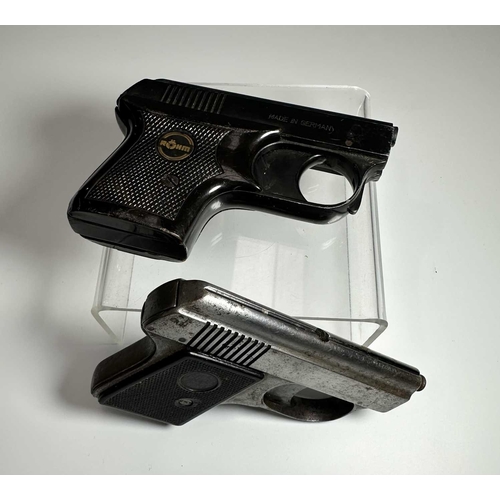 157 - Two vintage starter pistols, one in black steel and marked 'ROHM RG2' with a mock-tortoiseshell hand... 
