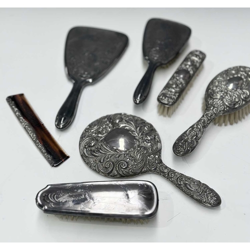 158 - A silver dressing table set, two brushes, a comb and a handheld mirror, Broadway & Co, Birmingham, 1... 