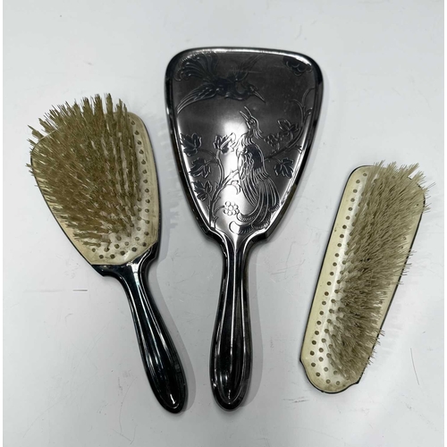 158 - A silver dressing table set, two brushes, a comb and a handheld mirror, Broadway & Co, Birmingham, 1... 