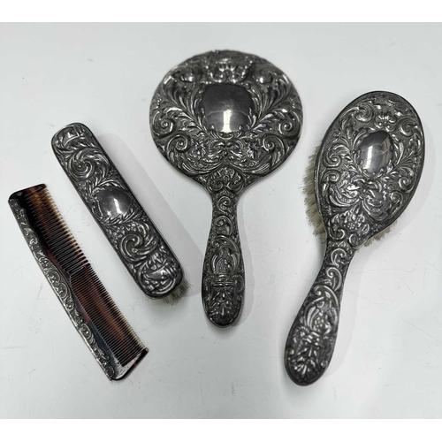 158 - A silver dressing table set, two brushes, a comb and a handheld mirror, Broadway & Co, Birmingham, 1... 