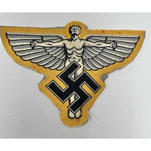 166 - A collection of militaria to include a Third Reich, Second Class Iron Cross on ribbon; a World War I... 