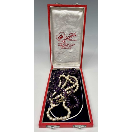 168 - Three various amethyst bead necklaces together with a simulated pearl example (1 box)