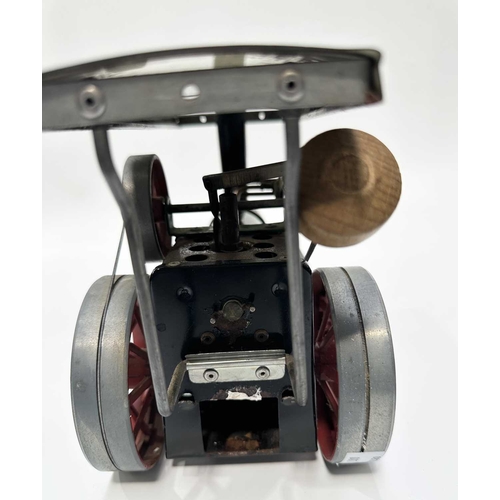 173 - A Mamod TE1A steam engine with drive stick/ steering rod l: 25.5cm, h: 17cm