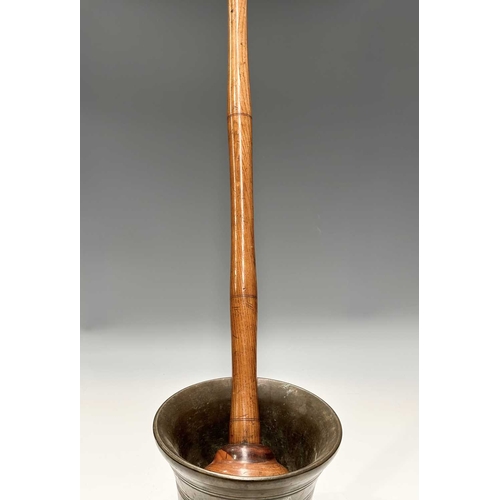 175 - A large and heavy bell metal mortar, 19th century or earlier, with ring turned decoration, height 22... 