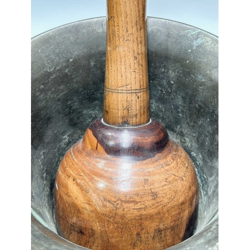 175 - A large and heavy bell metal mortar, 19th century or earlier, with ring turned decoration, height 22... 