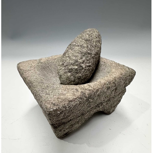 179 - A small stone, possibly ancient, pear-shaped mortar with pouring spout, height 6cm, a square basalt ... 