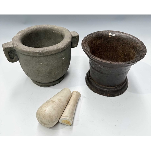 180 - A carved basalt or sandstone mortar with Etruscan or Greek style lugs/ears, height 18cm, diameter 19... 