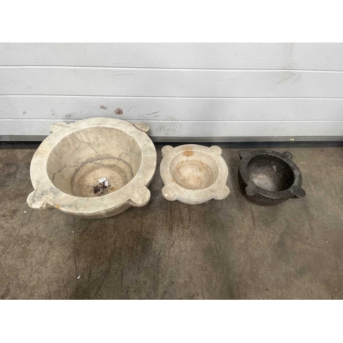 181A - A large white marble mortar, with four lugs, carved from a single block of marble, height 23cm, aver... 