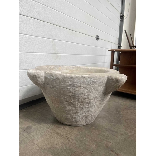 181B - A large carved white marble mortar, carved with four lugs from a single block of stone, without pest... 