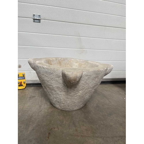 181B - A large carved white marble mortar, carved with four lugs from a single block of stone, without pest... 