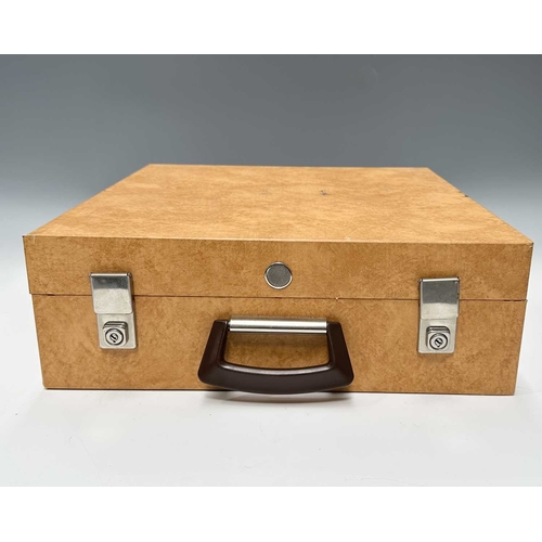 196 - A mid century, as new 'Brexton' picnic set for four, to include: a case with two orange, brown and b... 