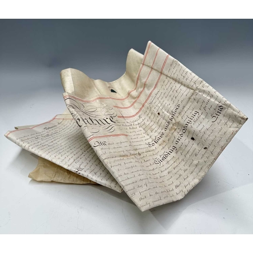 197 - Three vellum indentures, the earliest King James, 1611, 1829 and 1849, together with a carved Black ... 