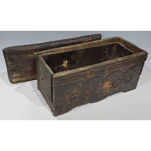 204 - A Tibetan wood and copper-bound altar with lockable drawer, 19th century or earlier, ruyi carved dec... 