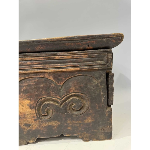 204 - A Tibetan wood and copper-bound altar with lockable drawer, 19th century or earlier, ruyi carved dec... 