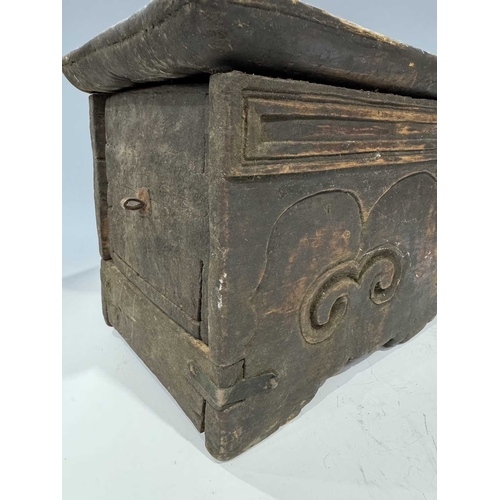 204 - A Tibetan wood and copper-bound altar with lockable drawer, 19th century or earlier, ruyi carved dec... 