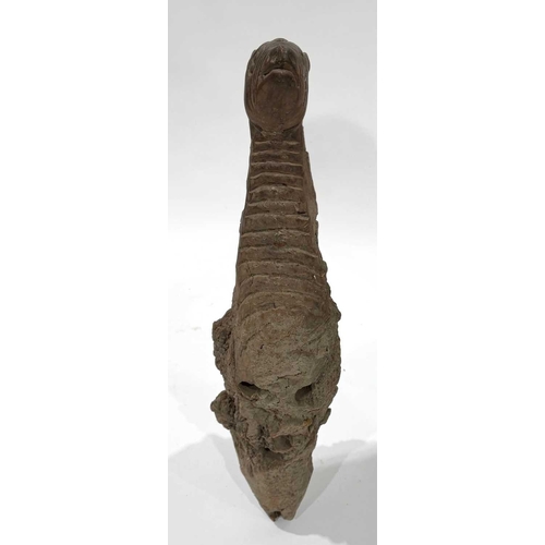 205 - A West Nepalese animist guardian figure, Humla region, a tree root with a smoothly carved portion to... 