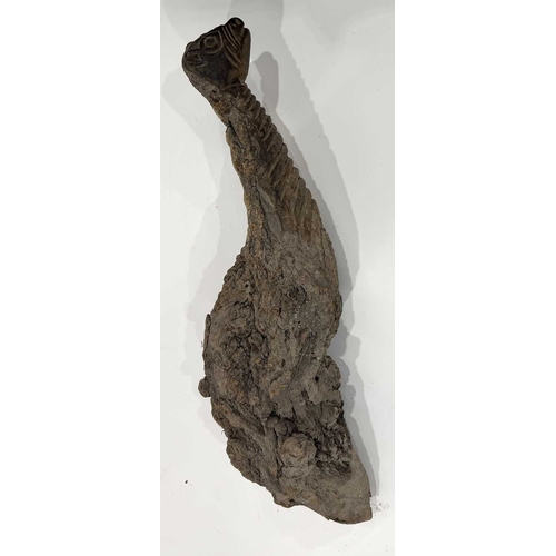 205 - A West Nepalese animist guardian figure, Humla region, a tree root with a smoothly carved portion to... 