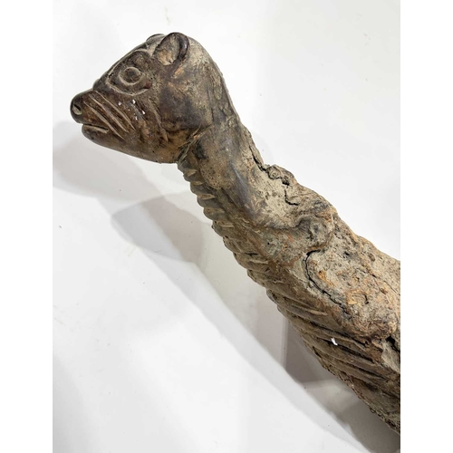 205 - A West Nepalese animist guardian figure, Humla region, a tree root with a smoothly carved portion to... 