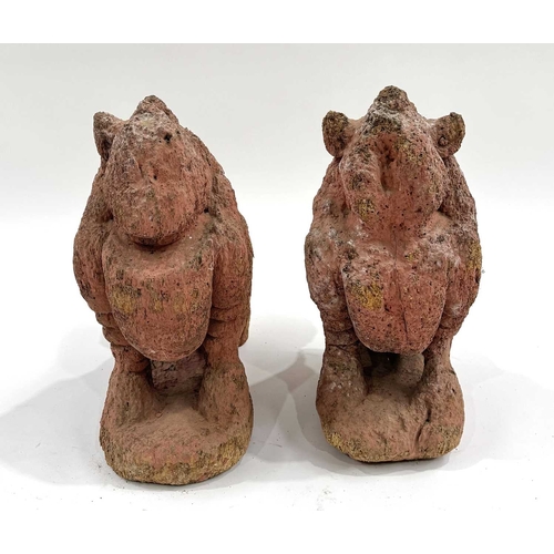 211 - A pair of Nepalese shrine guardians, polychrome wood, carved as mythical snow lions, associated with... 