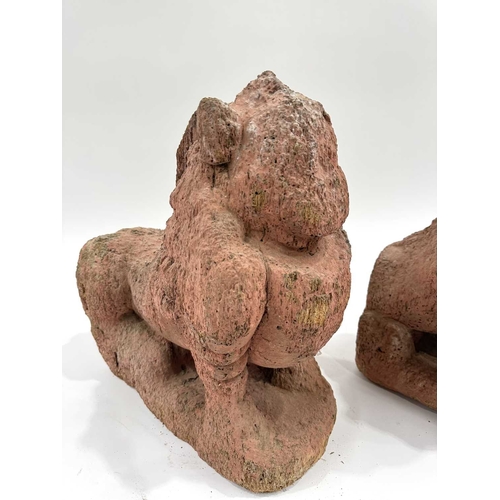 211 - A pair of Nepalese shrine guardians, polychrome wood, carved as mythical snow lions, associated with... 