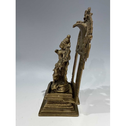 212 - A bronze shrine, Bengal, depicting the multi-armed figure of Durga or Chandiki, depicted in a dancin... 