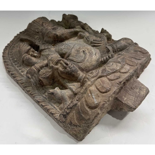 217 - A flat back relief carved Ganesha figure with his vahana rat companion, Mooshika or Mushika, grey sc... 