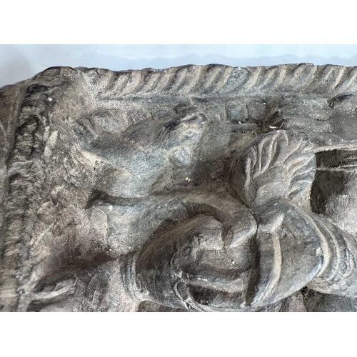 217 - A flat back relief carved Ganesha figure with his vahana rat companion, Mooshika or Mushika, grey sc... 