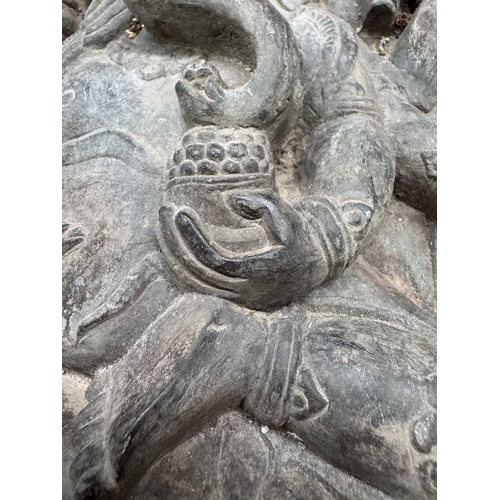 217 - A flat back relief carved Ganesha figure with his vahana rat companion, Mooshika or Mushika, grey sc... 
