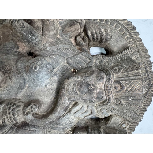 217 - A flat back relief carved Ganesha figure with his vahana rat companion, Mooshika or Mushika, grey sc... 