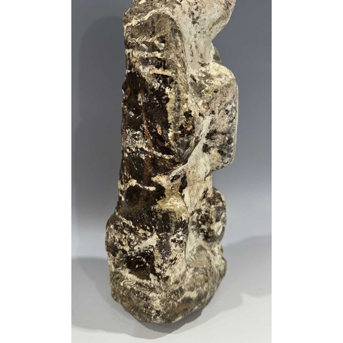 219 - A protective Nepalese ancestor guardian figure, carved stone, Humla region, North West Nepal, 19th c... 