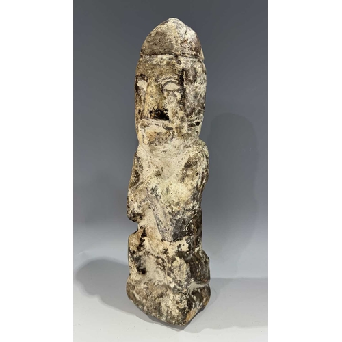 219 - A protective Nepalese ancestor guardian figure, carved stone, Humla region, North West Nepal, 19th c... 