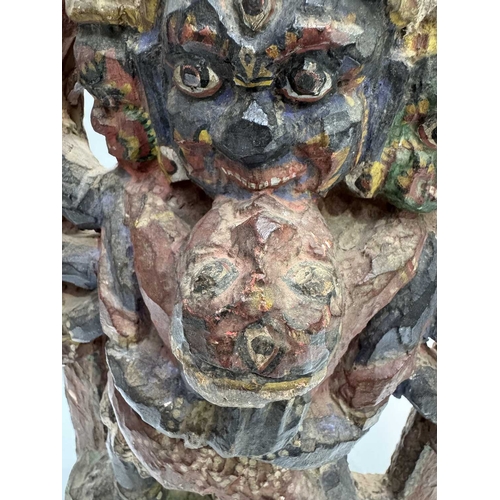 221 - A polychrome carved figure of Mahakala, a significant figure in Tibetan Buddhist and Hindu mythology... 