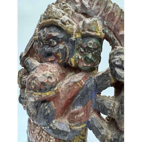 221 - A polychrome carved figure of Mahakala, a significant figure in Tibetan Buddhist and Hindu mythology... 