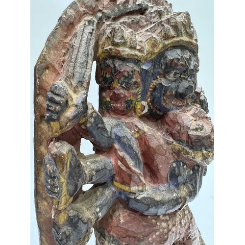 221 - A polychrome carved figure of Mahakala, a significant figure in Tibetan Buddhist and Hindu mythology... 
