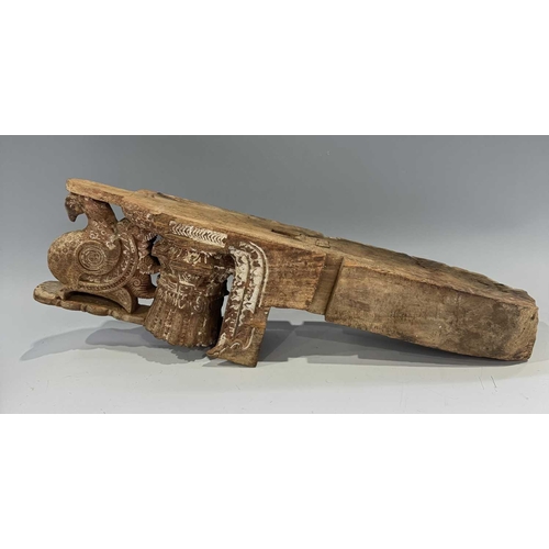 222 - A pair of Indian carved wood decorations, Assam, likely designed to flank a doorway, relief carved p... 