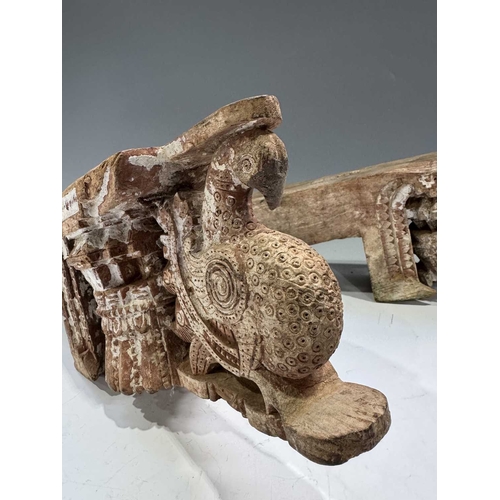 222 - A pair of Indian carved wood decorations, Assam, likely designed to flank a doorway, relief carved p... 