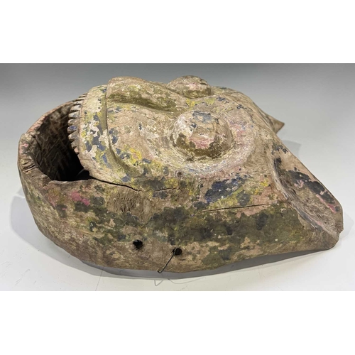 224 - A hand carved wood tiger head mask with layers of patinated polychrome decoration, modelled with poi... 
