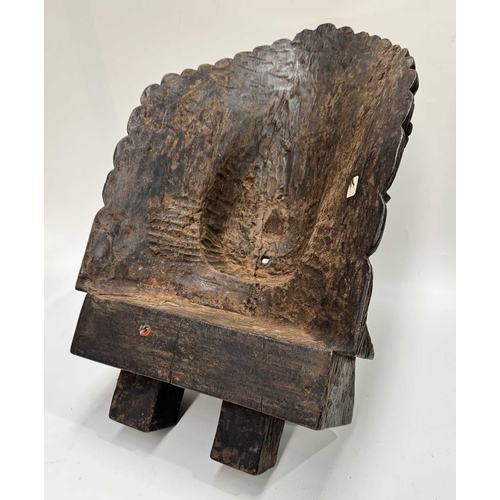 232 - A wooden shrine bust mask of Bhairava, Kathmandu valley, 18th century or earlier, ornately carved wi... 