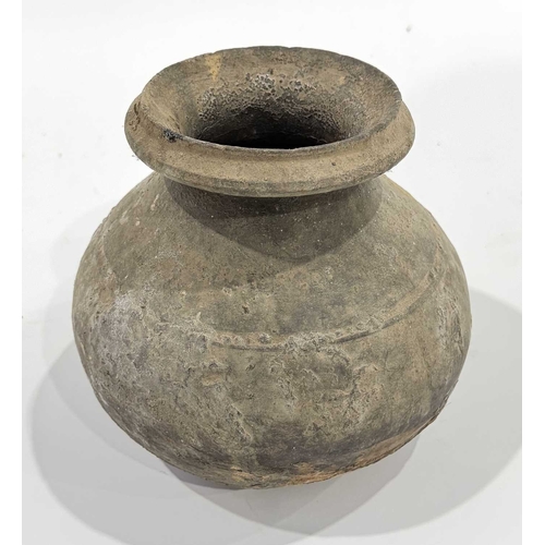 242 - Three 19th century Newari artefacts, an iron torch used in community and religious festivals, formed... 