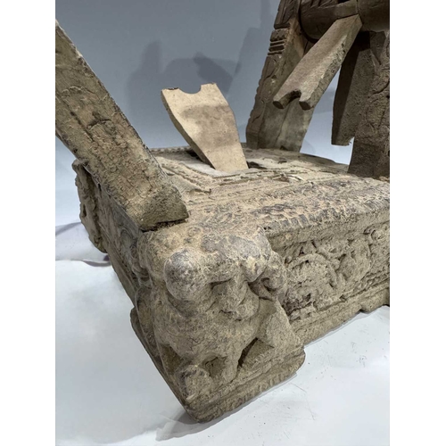 249 - A Himalayan cotton spinning wheel or charkha, 19th century or earlier, richly decorated, the corners... 