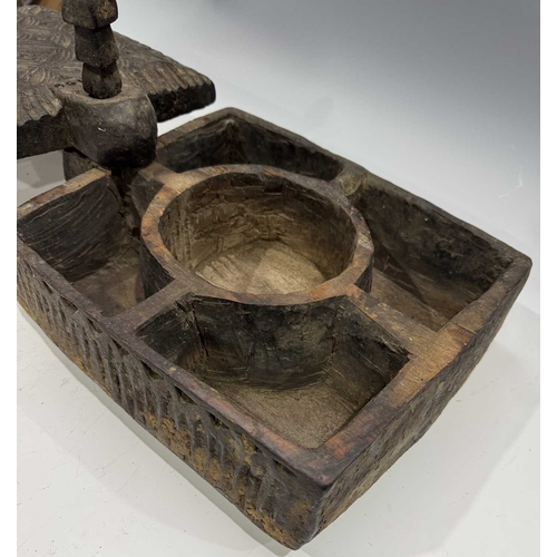 251 - A carved wood spice box, Dolpo region, Nepal, 19th century or earlier, repeat carved geometric flora... 