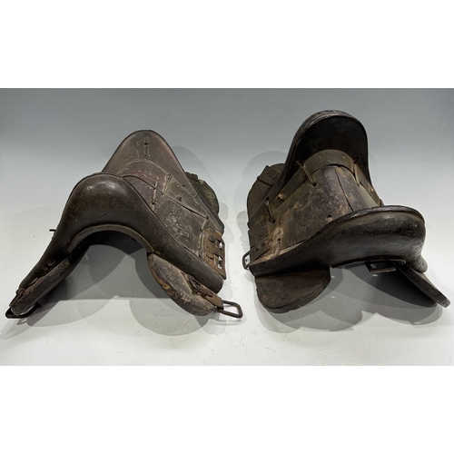 255 - Two Himalayan pony saddles, Mustang, on the Nepal/Tibet border, late 19th/early 20th century, carved... 
