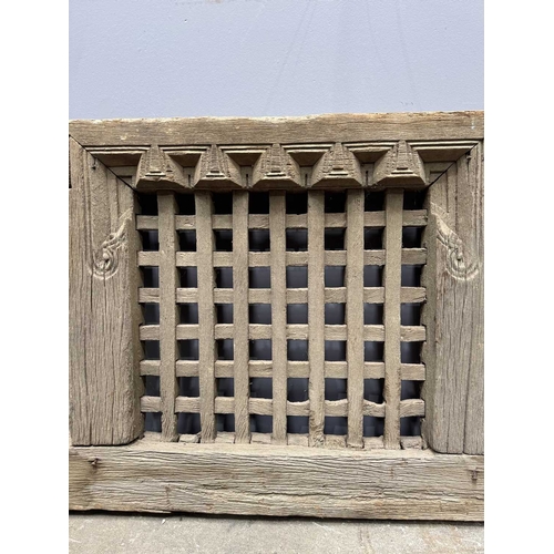 264 - Architectural salvage for decorative use, or as a garden feature, a Nepalese wooden window, 'H'-form... 