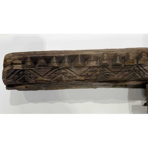 266 - A richly carved Nepalese window frame, 19th century or earlier, salvaged from a noble house or palac... 
